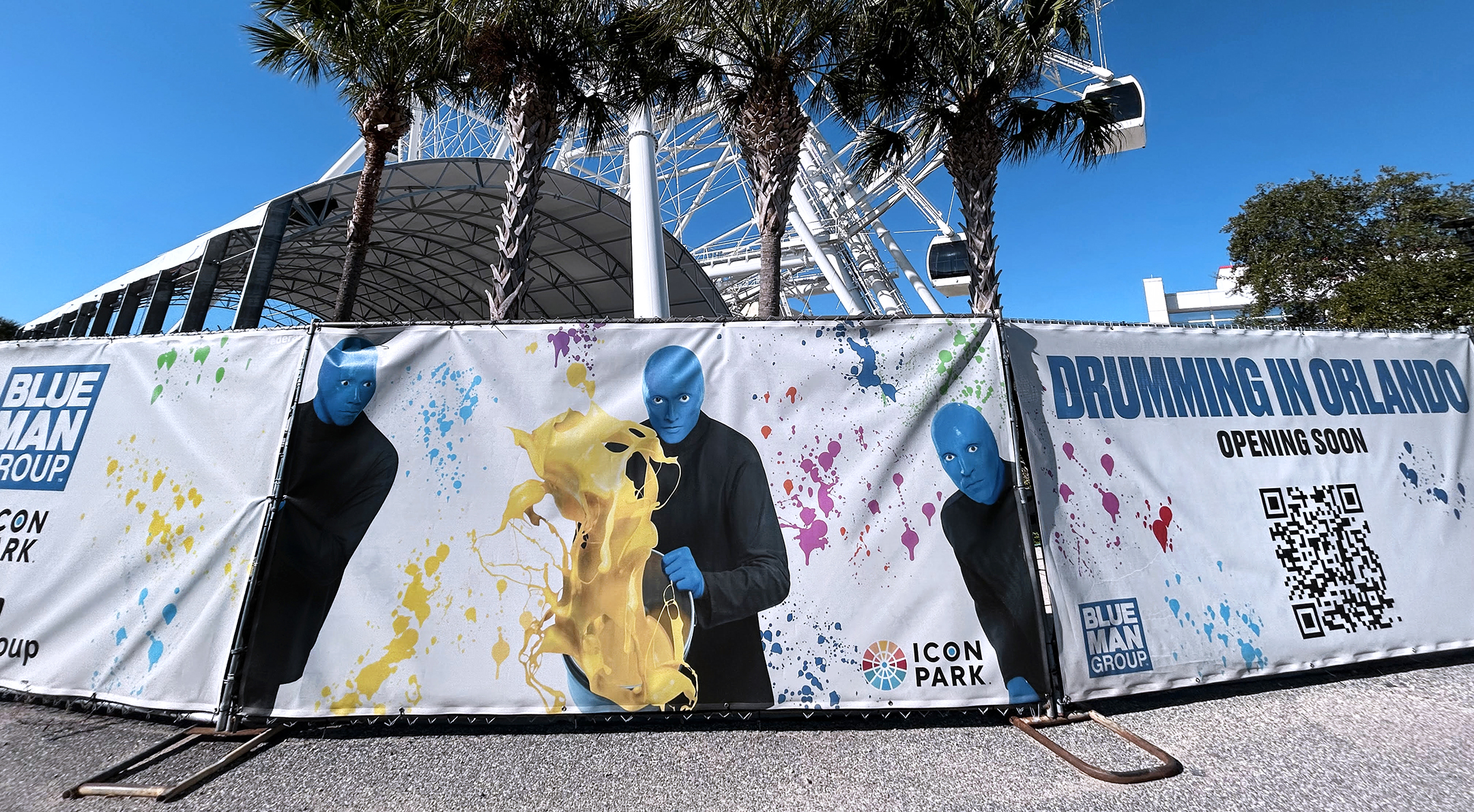 The construction wall by the future Blue Man Group theater at ICON Park.